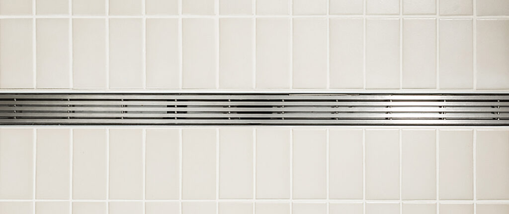 QuickDrain's customizable ProLine linear drain shower solution can be installed by contractors in a variety of environments