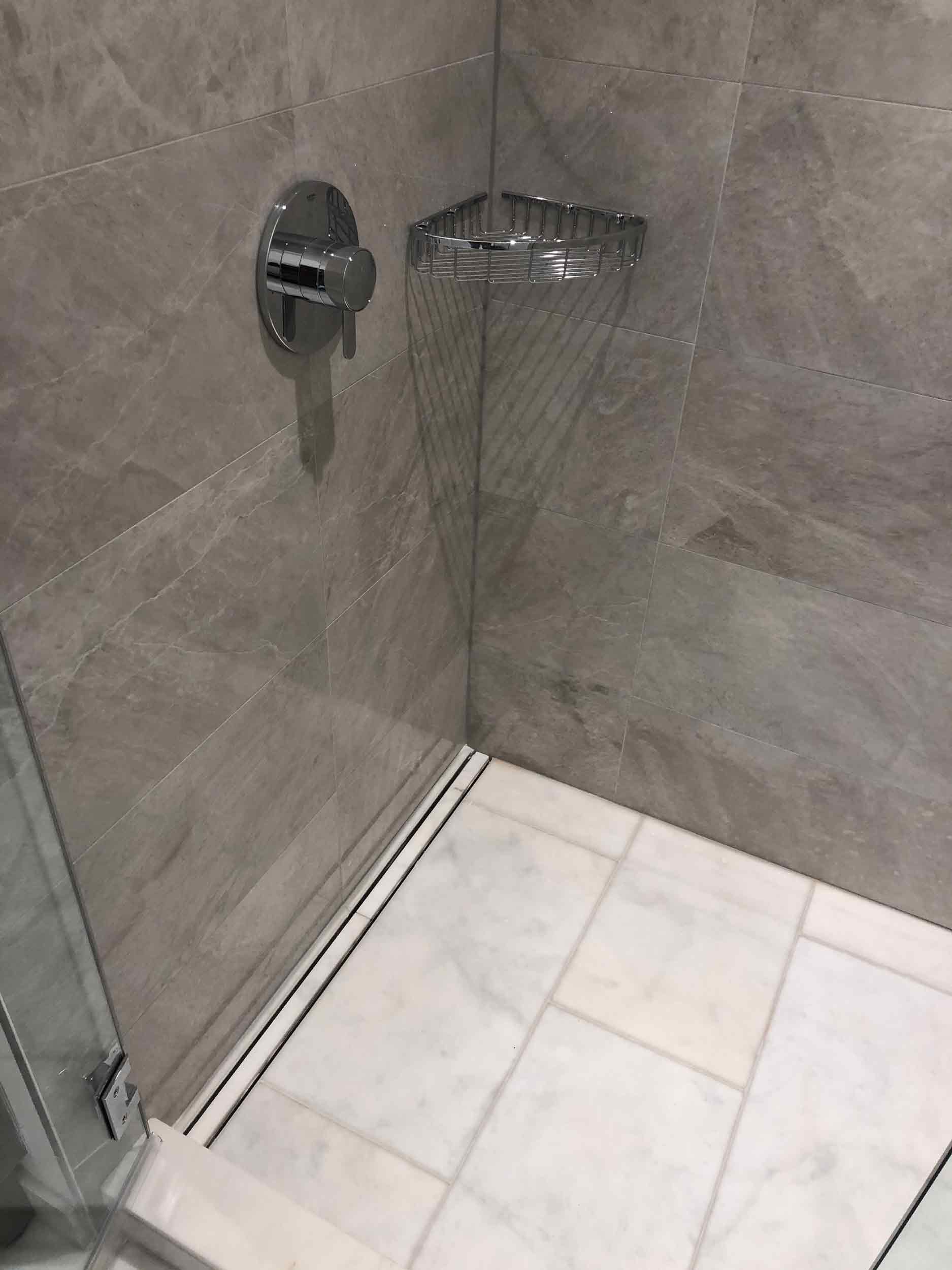 A QuickDrain Tile In shower system in a tiled shower